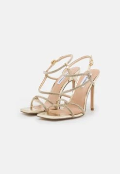 Steve Madden Implicit - Sandalen Met Hoge Hak - Gold 10 Steve Madden Implicit - Sandalen Met Hoge Hak - Gold -Dameskledingwinkel bf3ca453b0184f97aae795f92b034ca0
